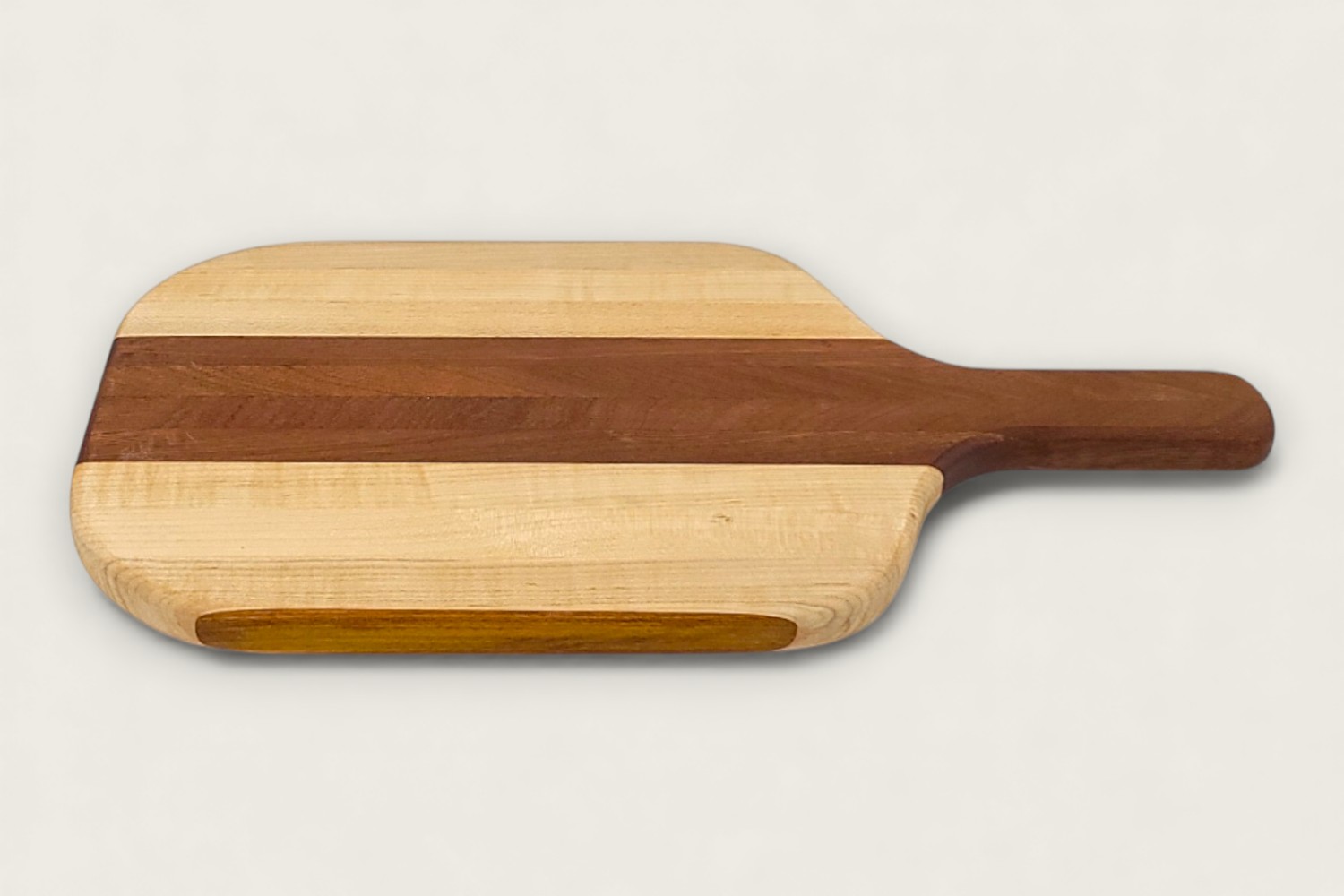 Pickleball Inspired Charcuterie Board (#365) in light maple edge grain with horizontal pattern and cutout handle.